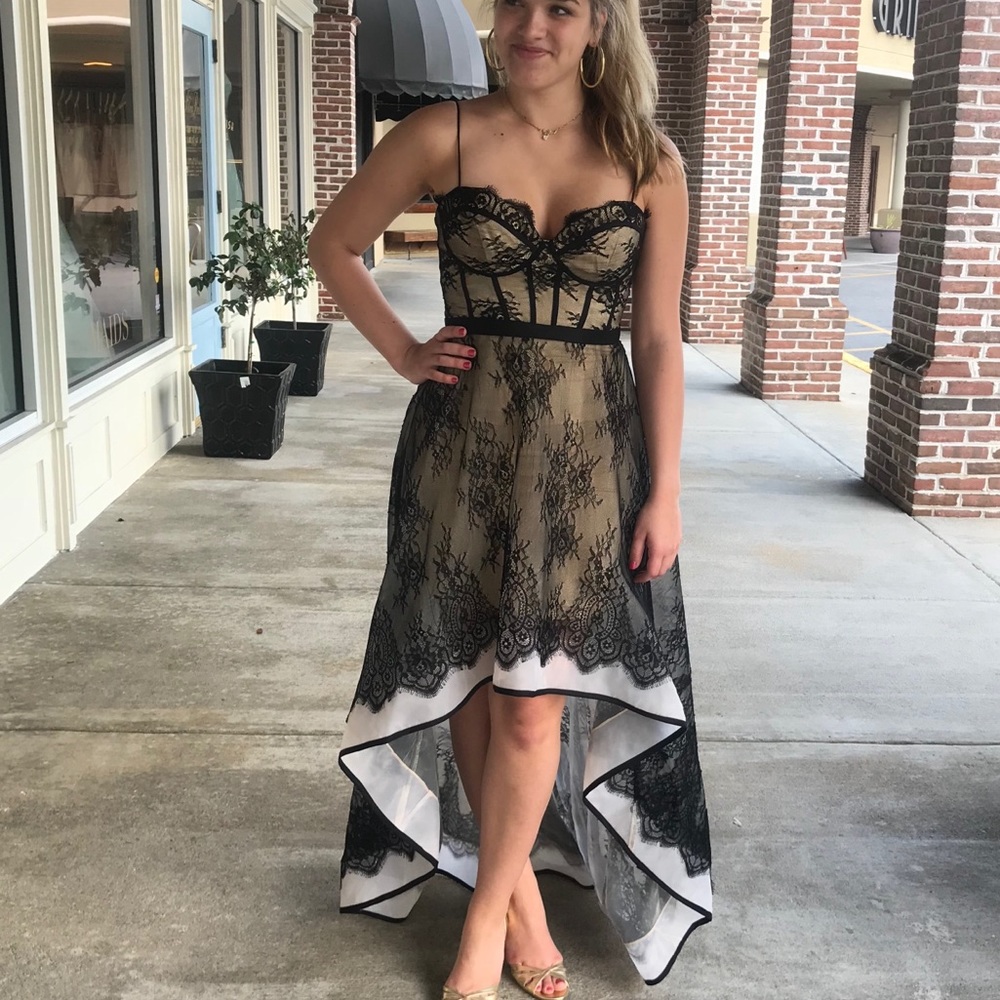 Black lace over nude dress